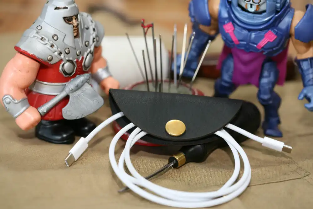 Handcrafted leather wire holder
